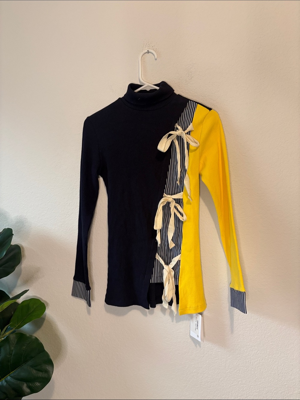 Colorblock Black Turtleneck Sweater with Yellow Sleeve Accent and bows